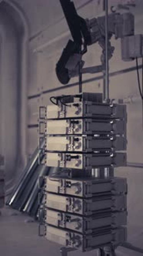 Stack of Modern Communication Devices in a High Tech Facility Setting