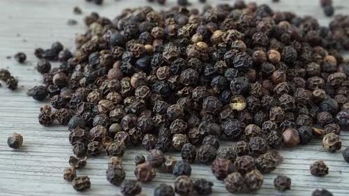 Peppercorns from a black pepper plant (Piper nigrum)