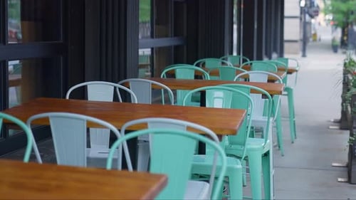 Cafe or restaurant empty chairs and tables during weekend or rest day. Vacation or foreclosure. No