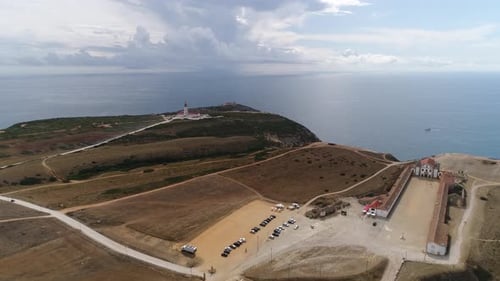 Aerial drone view of lighthouse on Cabo Espichel cape Espichel on Atlantic ocean