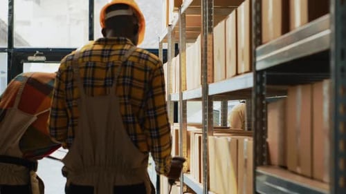 Warehouse Workers Scanning Inventory with Tablet and Scanner