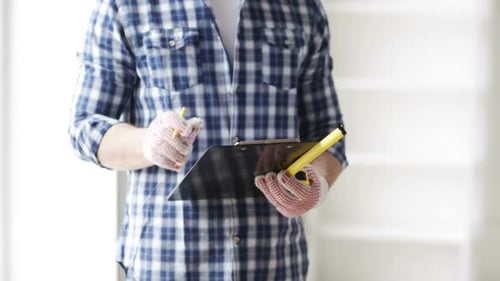 Repair, Building, Construction and People Concept - Close Up of Man With