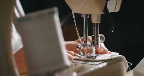Close Up of Sewing Machine Working on Fabric