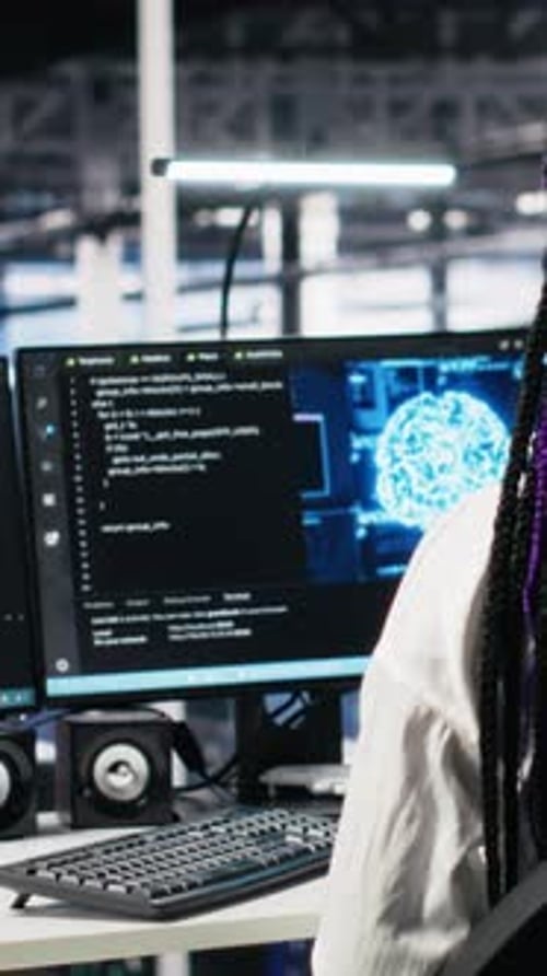 Vertical Video Data Center Female Programmer Uses Machine Learning Algorithms to Analyze Datasets