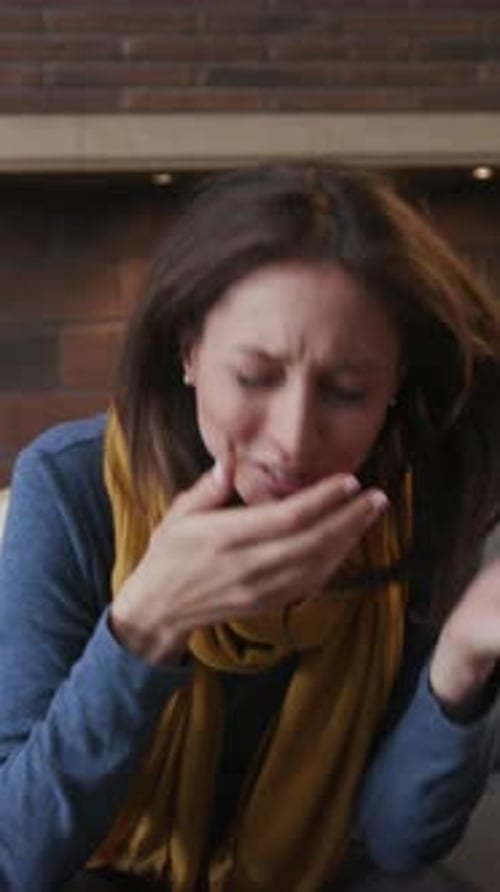 A Woman Who is Experiencing Stress and Anxiety in a Deeply Thoughtful Moment of Reflection