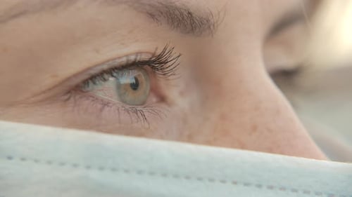 Close-Up Portrait of Modern Young Doctor Woman Wearing Protective Medical Face Mask