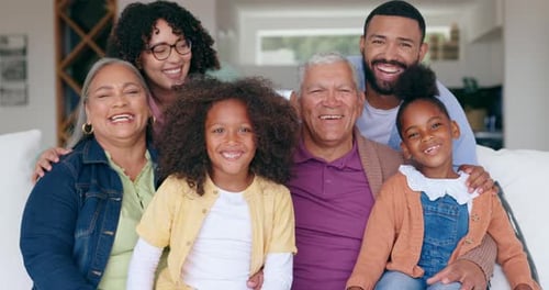 Smiling Multigenerational Family Poses Together at Home