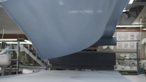 The Manufacturing Process of Industrial Fabric Production Line Involving Blue Material