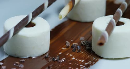 For making sweets the professional confectioner makes exquisite desserts. Concept: the production