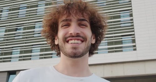 Smiling Young Adult in an Urban Setting