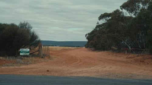 Cinematic: Australian Outback Road Through Red Desert Bush