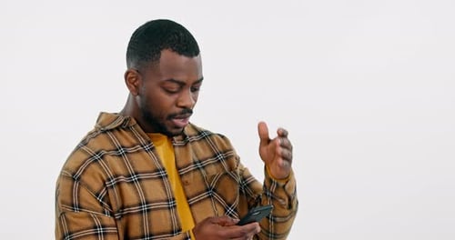 Student, man and phone with news, stress or confused for college results or mistake in studio