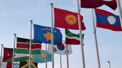Flags from around the world flapping in wind