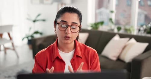 Woman Speaking During Online Video Call in Living Room