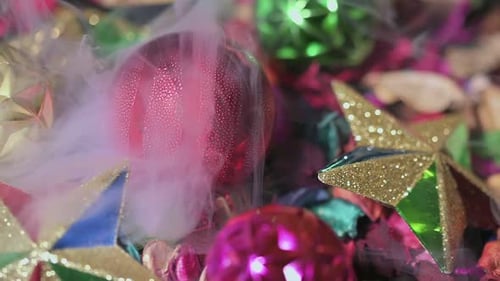 Christmas Ornaments with Glittering Stars in Fog