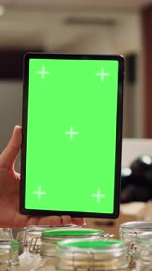 Vertical Video Man Uses Isolated Screen Tablet in Shop