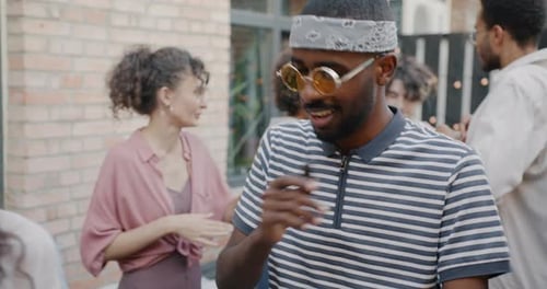 Friends Gathering at Outdoor Urban Party