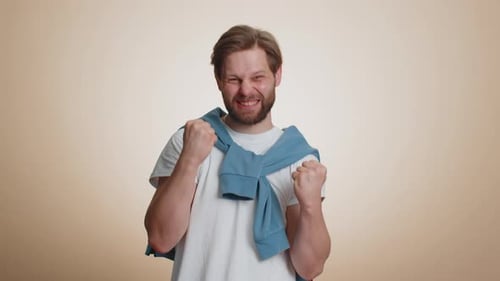 Man Celebrating Success, Joy, and Positive Achievement