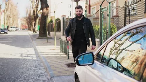 Slow Motion Young Man Walk Sitting in Car on Street Serious Happy Sunset Vehicle Sit Arm Auto Street
