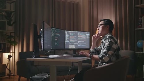Asian Male Programmer Thinking While Creating Software Engineer Developing App, Program