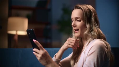 Woman Talking on Phone Indoors at Home