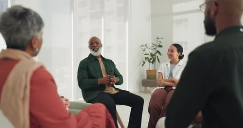Black man, psychology or therapy meeting in circle for wellness with mental health