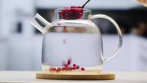 Frozen Cranberries Cooking for Tea or Jam Background Close Up of Cranberry Berries in on the Kitchen