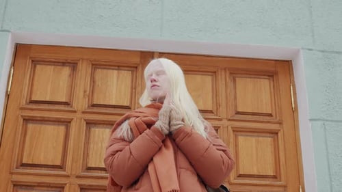 Young Woman With Albinism On Winter Day