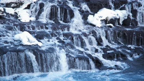 Waterfall in Iceland Snowy Mountain and Cold River Winter Pure Glacier Water