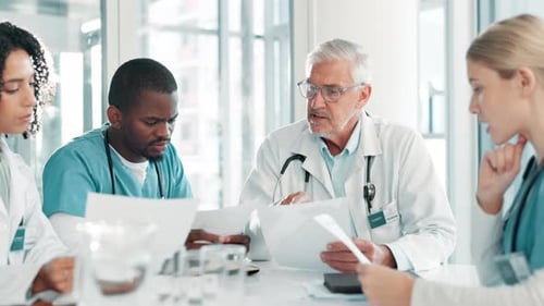 Medical Team Collaborates in a Bright Hospital Office
