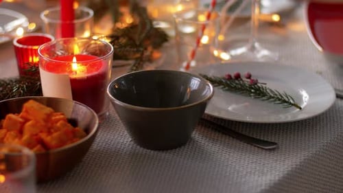 Close-up of Holiday Table Setting with Food