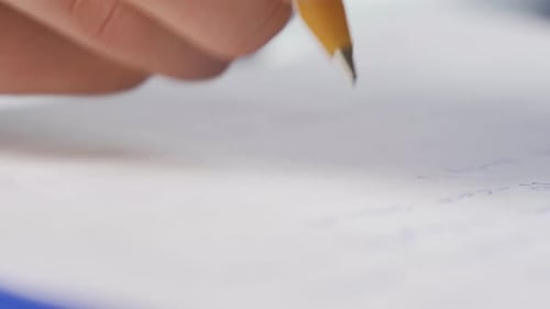 Writing with a close-up pen.