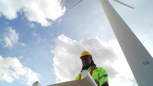 Portrait Engineer Near Wind Turbines Develop Ecological Energy