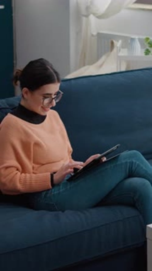 Vertical Video Female Student Using Digital Tablet to Do Remote School Work