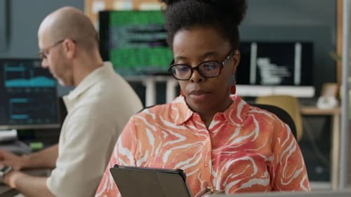 Diverse Programmers Working in Modern Open Space Office
