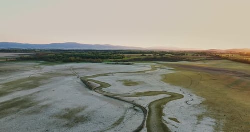 Sunset Over Dry Rural Riverbed Aerial