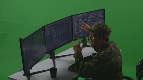 Happy Man Celebrating And Dancing While Write Code With Multiple Screens In Green Screen