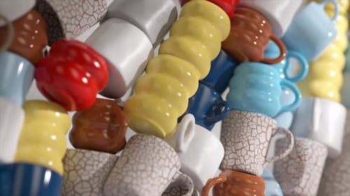 Nahaufnahme von bunt strukturierten 3D-Kaffeetassen, die abstrakt gestapelt sind