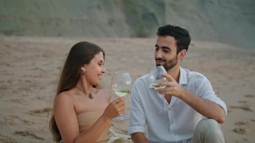 Young Newlyweds Celebrate Date at Beach Nature. Closeup Relaxed Lovers Drinking Champagne