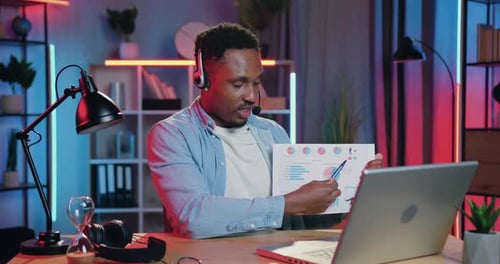 Man Presenting HR Data During Online Conference