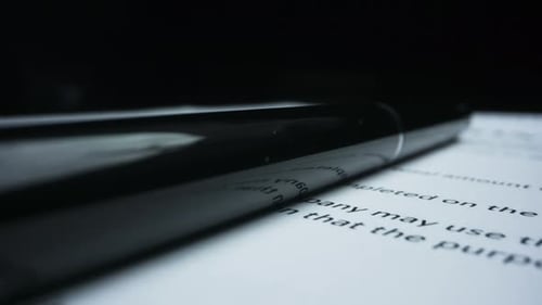 Pen Lying on Paperwork Revealing Top Secret Document
