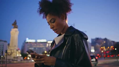 African Woman Texting Night Street Wearing Jacket Closeup Lady Messaging Phone