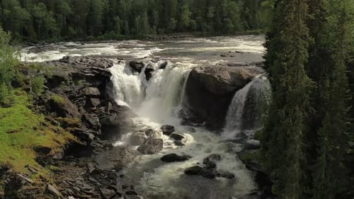 Aerial View of Waterfall in Forest Environment