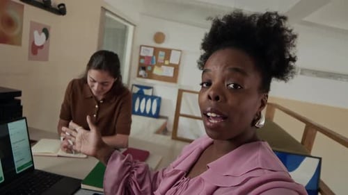 POV of Engaged Team Planning Session in Creative Office