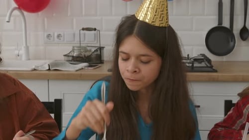 Portrait of Cute Adolescent Girl Enjoying Delicious Sweets at Birthday Party
