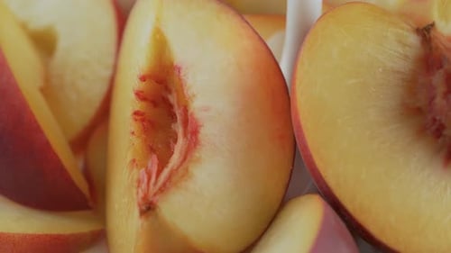 Delicious Halved Peaches in a Creamy Setting