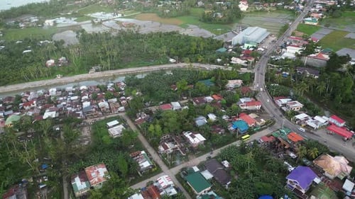 Coastal Town with Highway Streets and Small Houses Among Trees