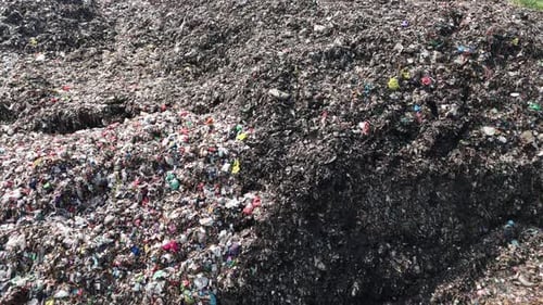 Aerial view from top of garbage dump with many trash