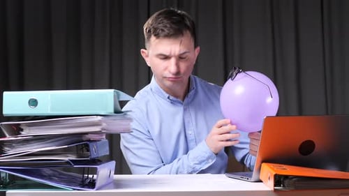 a Man in the Office Makes a Hand Gesture Blah Blah Blah