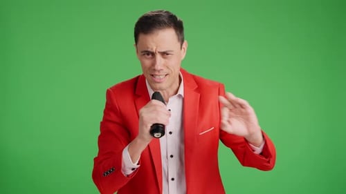 Enthusiastic Showman Introducing Performer on Green Screen